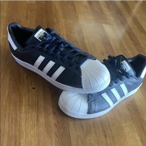 adidas Originals Blue Athletic Shoes with Iconic White Stripes